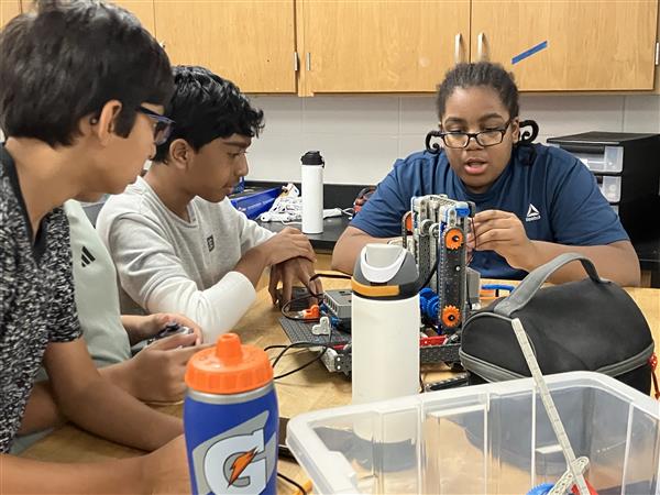 Students working on a robot.